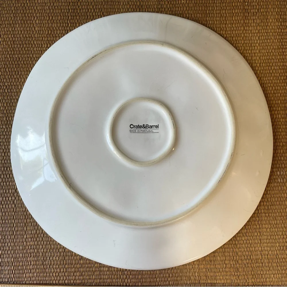 Crate & Barrel white organic wavy dinner plate